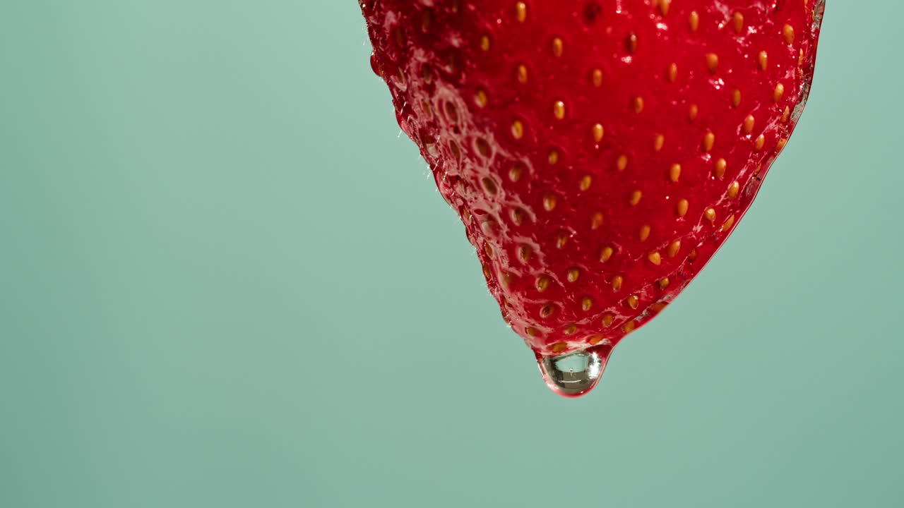 Close-up of a strawberry with a water drop