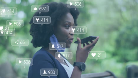 Animación-De-Notificaciones-De-Redes-Sociales-Sobre-Una-Feliz-Mujer-Afroamericana-Hablando-Por-Teléfono-Inteligente