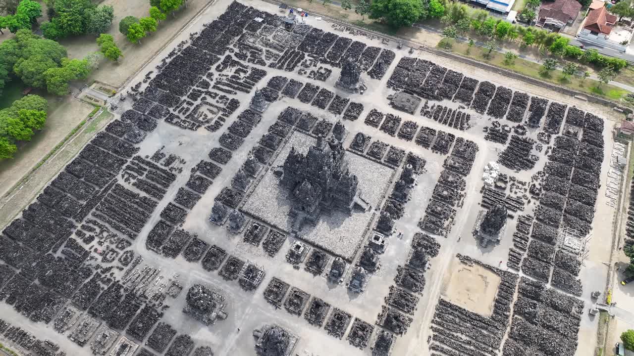 Aerial of Sewu Hindu Unesco site in Indonesia. Ruins after earthquake and mandala patterns.