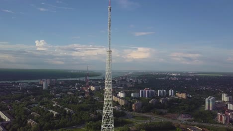 aerial view of a communication tower and cityscape