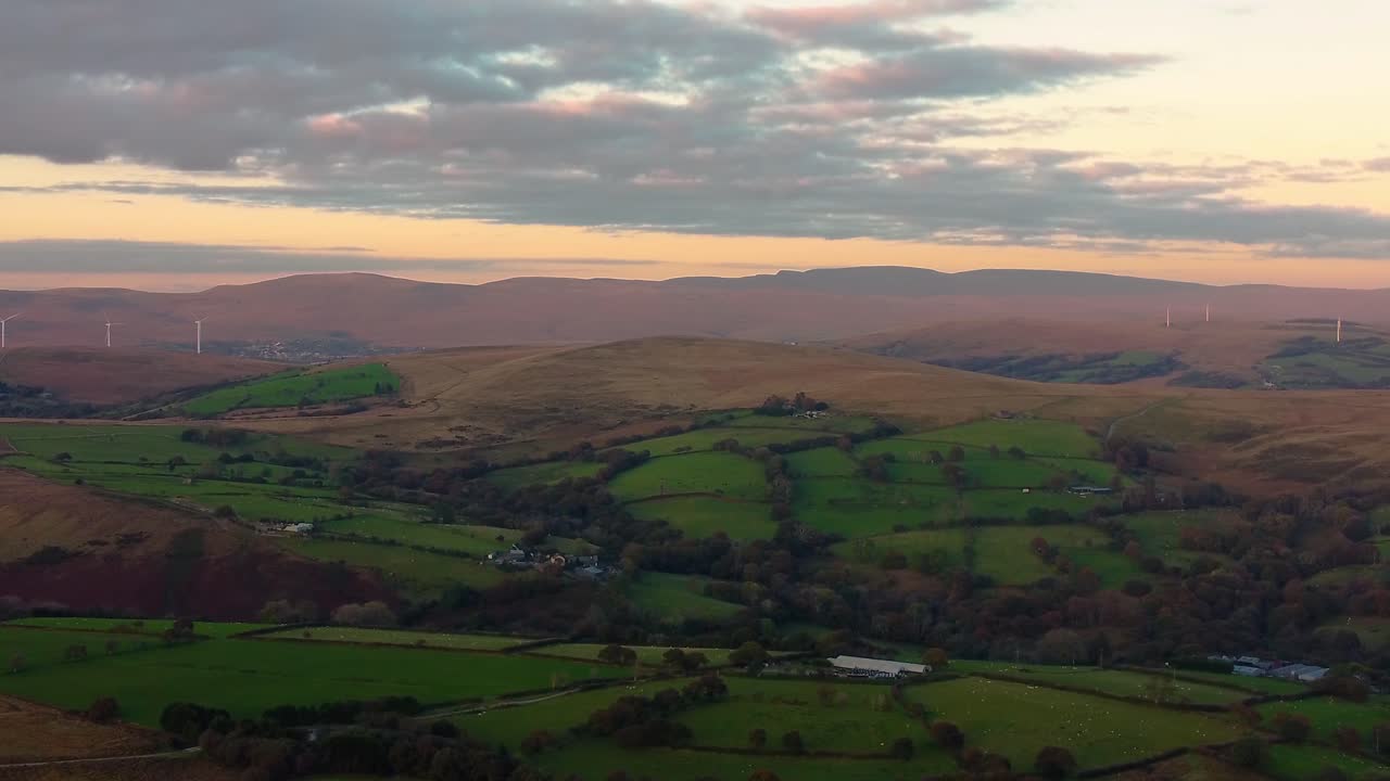 Breathtaking Aerial View of a Serene Valley at Sunset