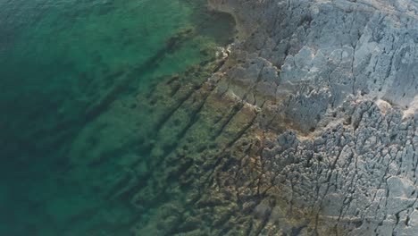 Aerial-wide-shot-of-a-beautiful-coast-line-on-Cape-Kamenjak,-Croatia