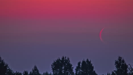 waning crescent moon rise in red color sky, fusion time lapse