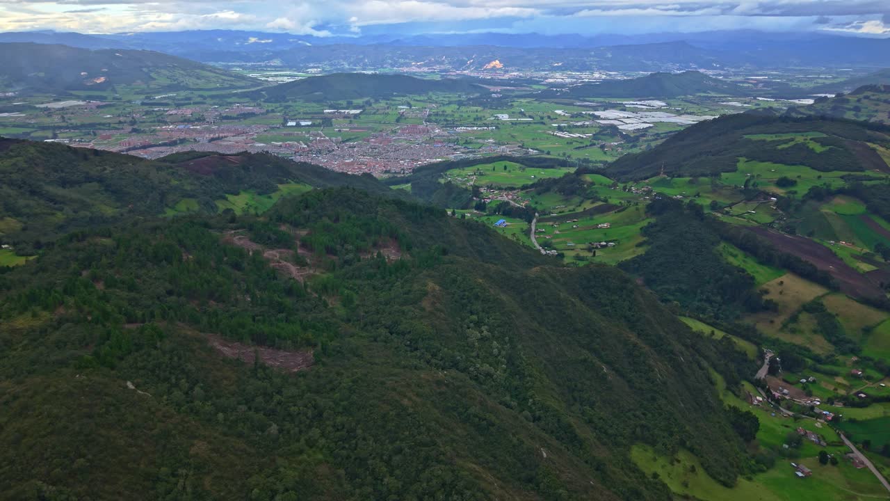 Aerial view of lush mountains and Zipaquira city in Colombia