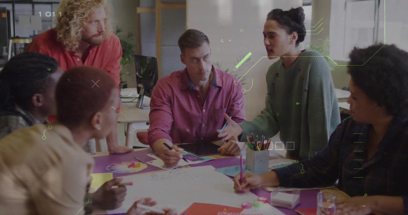 Team leaning into review starting business plan woman pointing printout and man annotating tablet