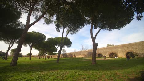 people walking around parco degli acquedotti