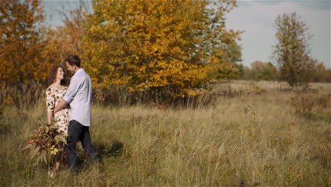 smiling lovers in golden meadow