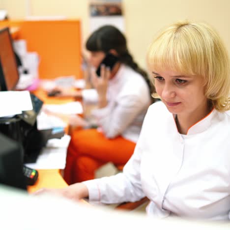 woman behind the reception desk
