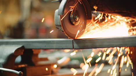 Angle-Grinder-Cutting-Metal-At-Workshop-35