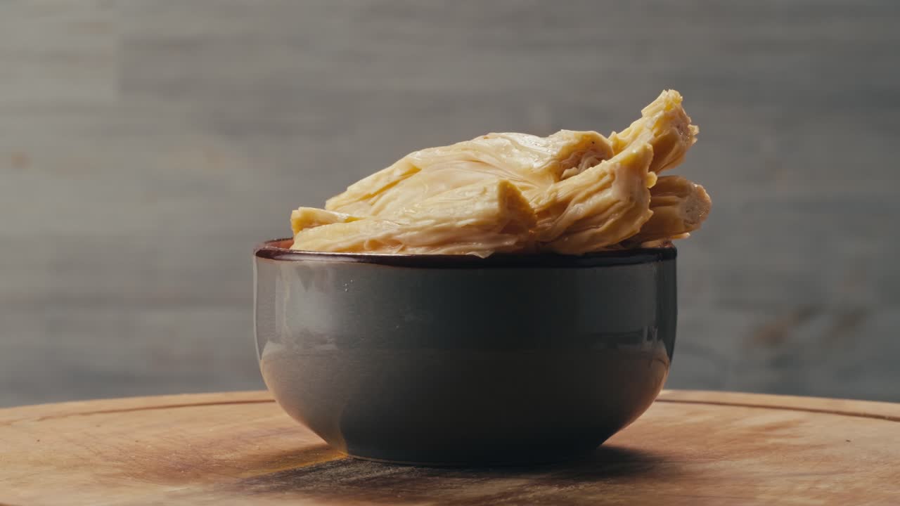 Fermented soy food Fuzhou, Tofu skin yuba sticks or Fuzhu on plate. Healthy asian soy food, Korean and Chinese cuisine.