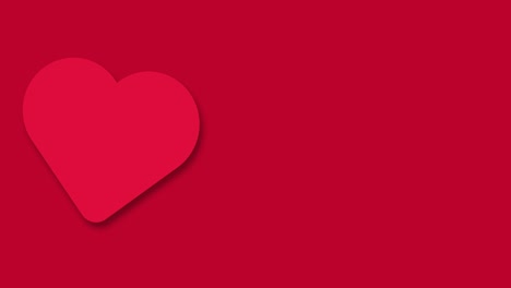 animación pulsante o golpeante de un corazón rojo aislado en fondo rojo. animación del día de san valentín que late el corazón. pancarta con espacio de copia