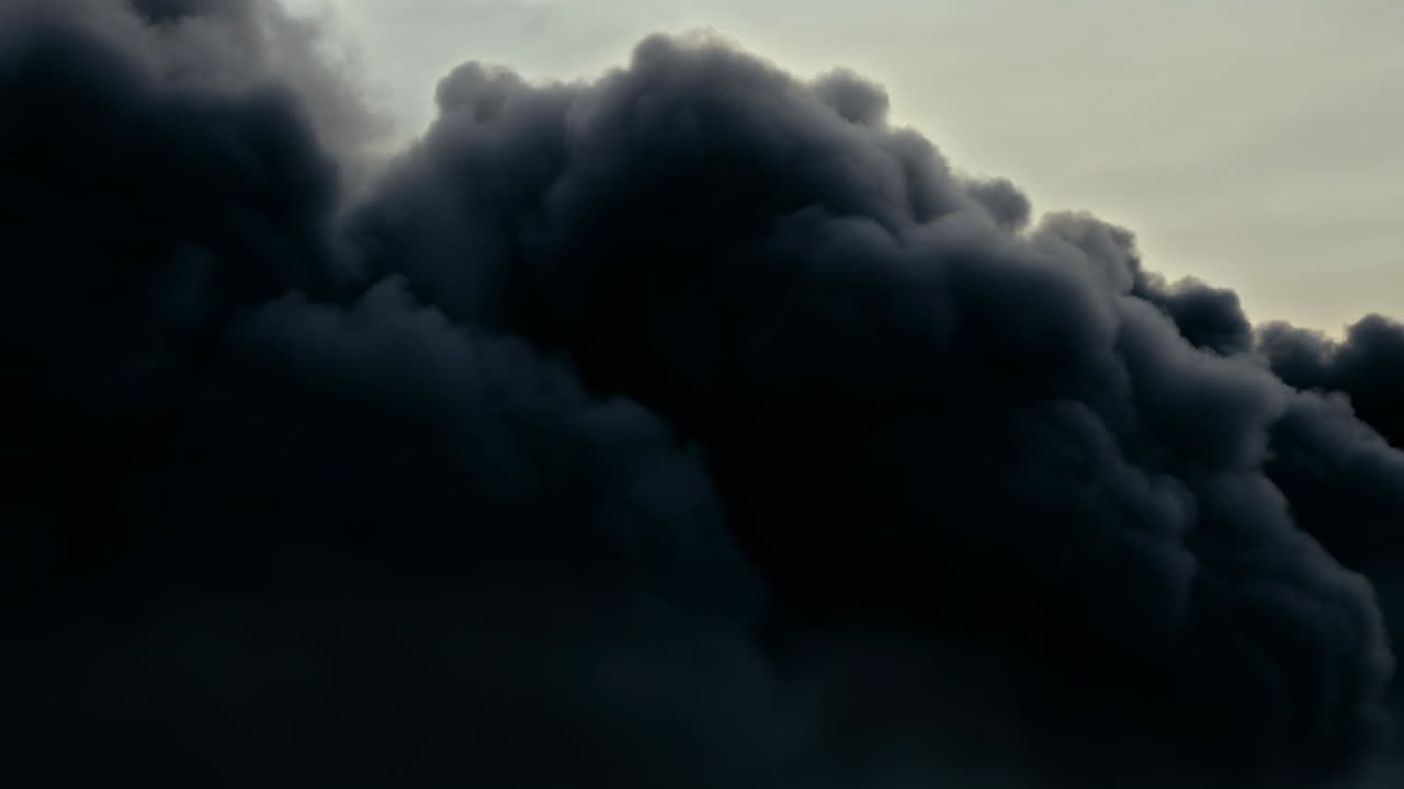 Brooding Dark Clouds Roll Across Sky With Heavy Mass And Backlit Edges, Thick Cumulonimbus Shapes Create