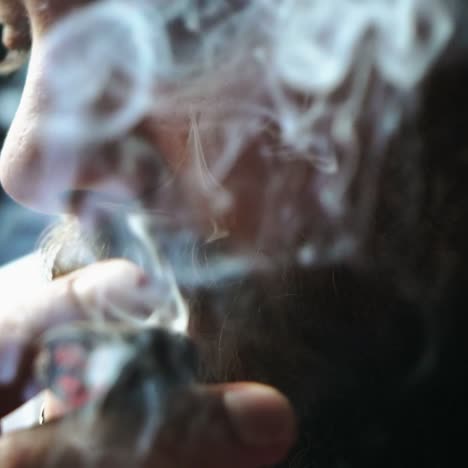 Man smoking cigar