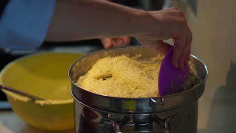 Making-Boiled-Lumps-Of-Potato-Dough-With-Spaetzle-Maker