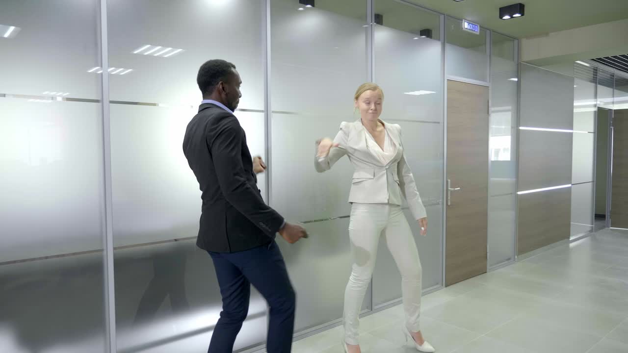 happy business team celebrating victory in office.