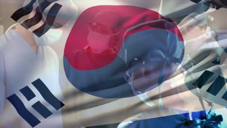 animación de la bandera de corea del sur sobre diversos cirujanos con máscaras faciales durante la cirugía.