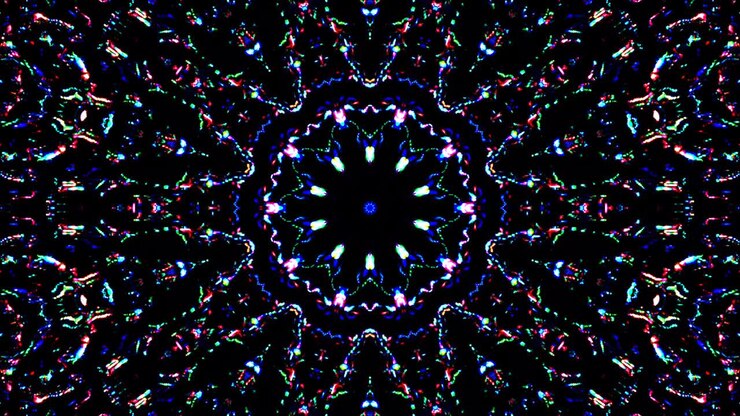 Krásný abstraktní kaleidoskop, který září, zářivé světlo, které reguluje jemné pohyby