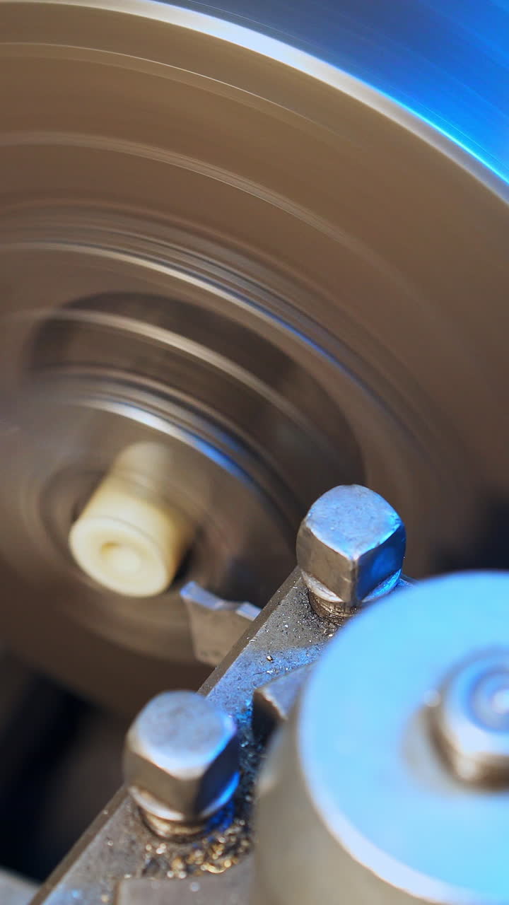 New machine stand industry. Modern turner working with instrument. Vertical video