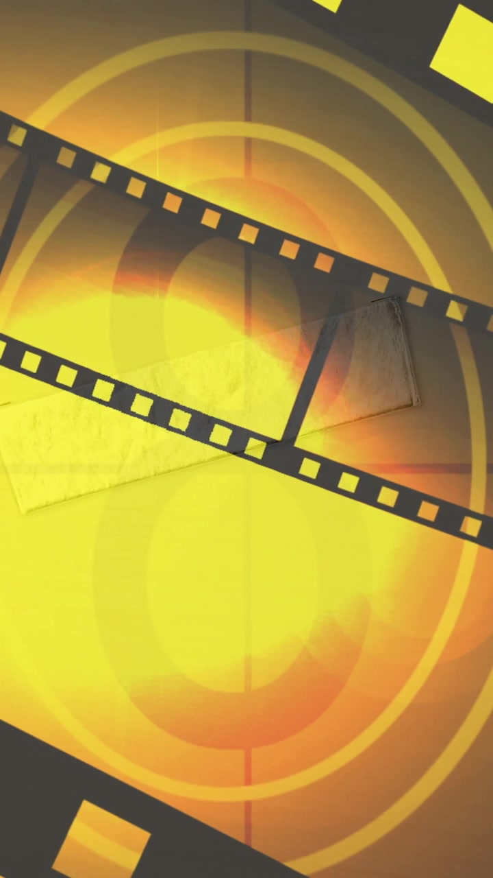 Animation of film reels moving over countdown and light spots against yellow background