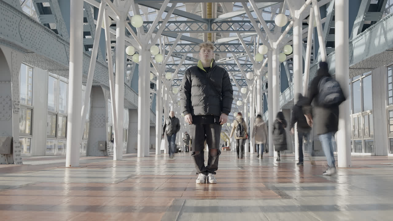 Young Man on a City Bridge