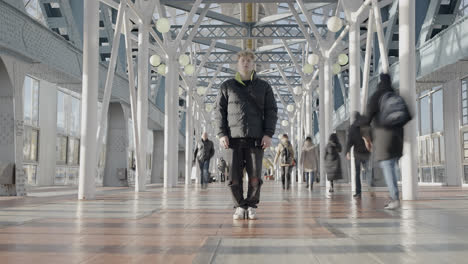 young man on a city bridge