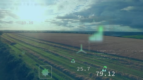 animation of eco icons and data processing over countryside farm land