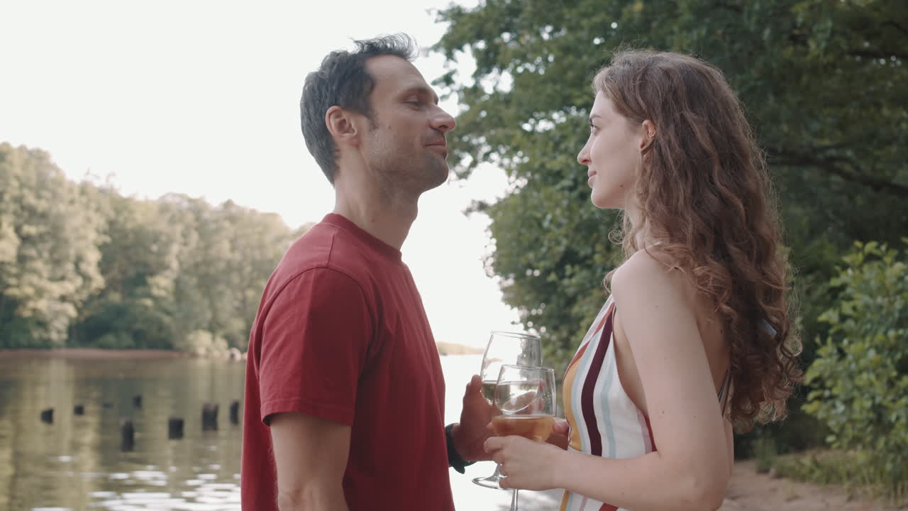 Couple Drinking White Wine in Nature