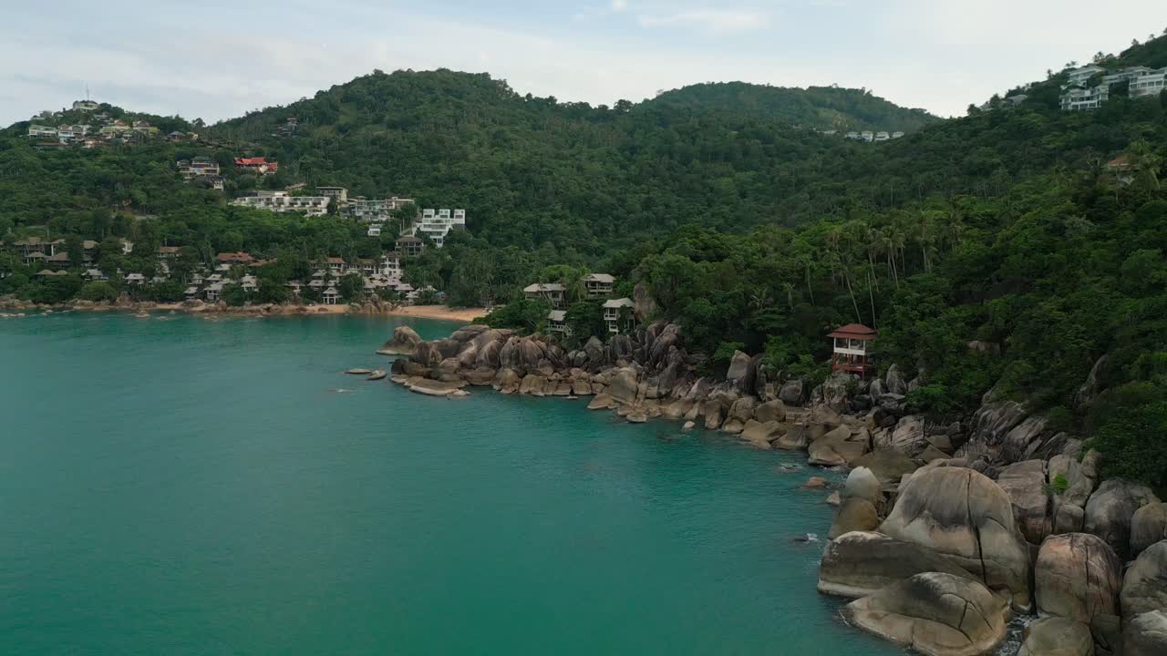 Bay panoramic drone of Thailand Koh Samui's Coral Cove Beach jungle mountain, tropical southeast asian hidden resort location