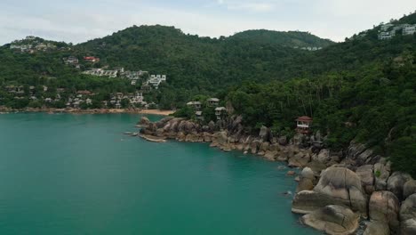 bay panoramic drone of thailand koh samui's coral cove beach jungle mountain, tropical southeast asian hidden resort location