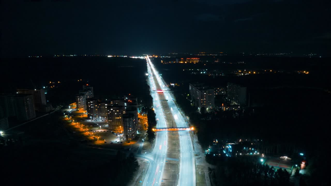 Hyperlapse timelapse of night city traffic fast cars driving around on ...