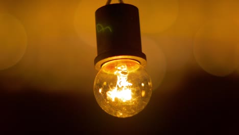 illuminated light bulb at night, business idea concept