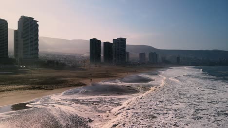 morning sunrise by the pacific ocean in iquique, chile