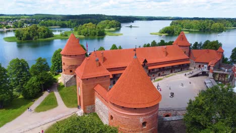 red rooftop and historical castle of trakai in galve lake island, aerial view