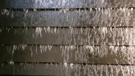 a wishing fountain where people drop their coins for good luck