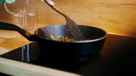 woman cooking stir-fry