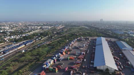 high-altitude drone view capturing local trains passing through chennai