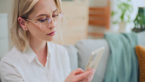 Businesswoman-Works-with-Mobile-Phone