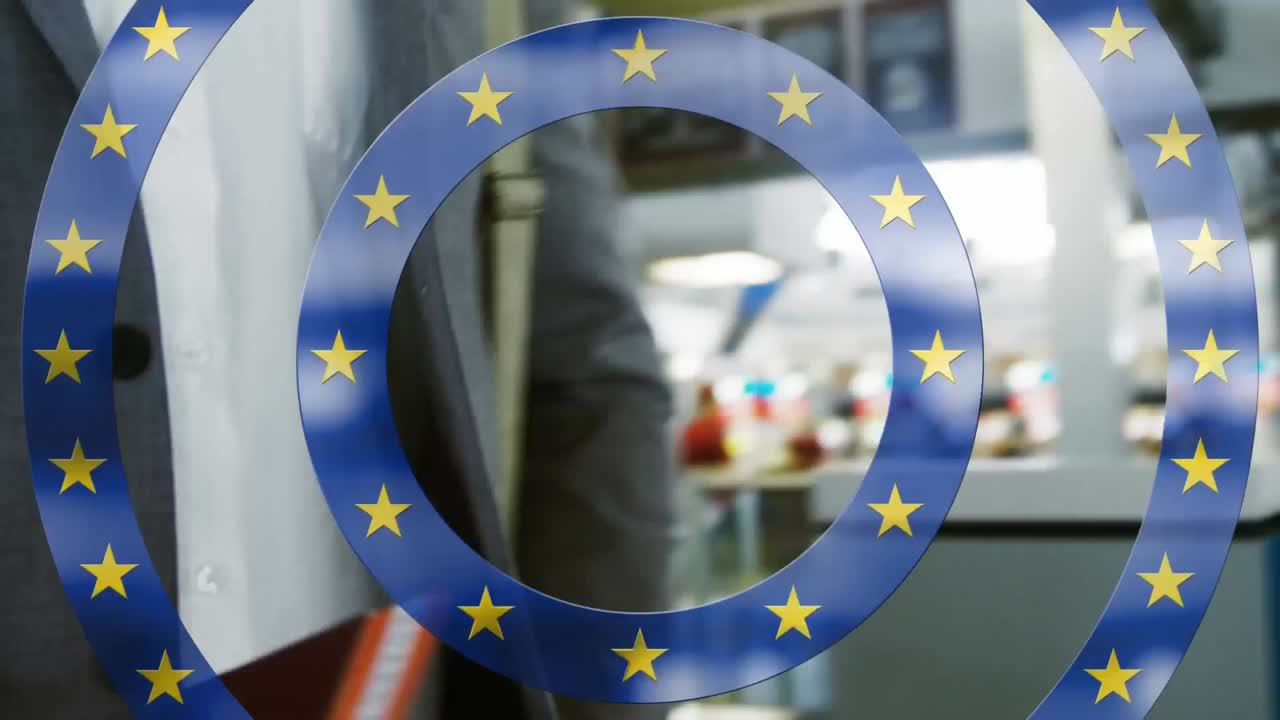 여권을 들고  ⁇ 고 있는 남자 를 향해 회전 하는 노란색 별 들 의 디지털 복합 비디오