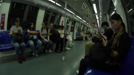 people commuting on a train