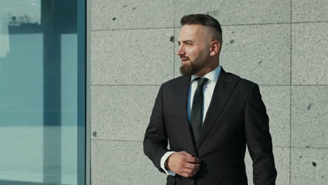 businessman in front of a building