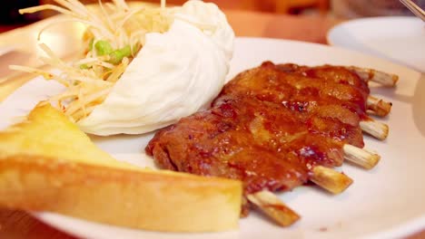 honey roasted pork ribs with toast and salad