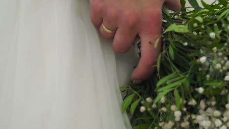 bride holding wedding bouquet