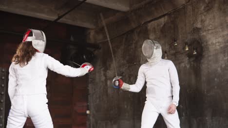 two fencers in action