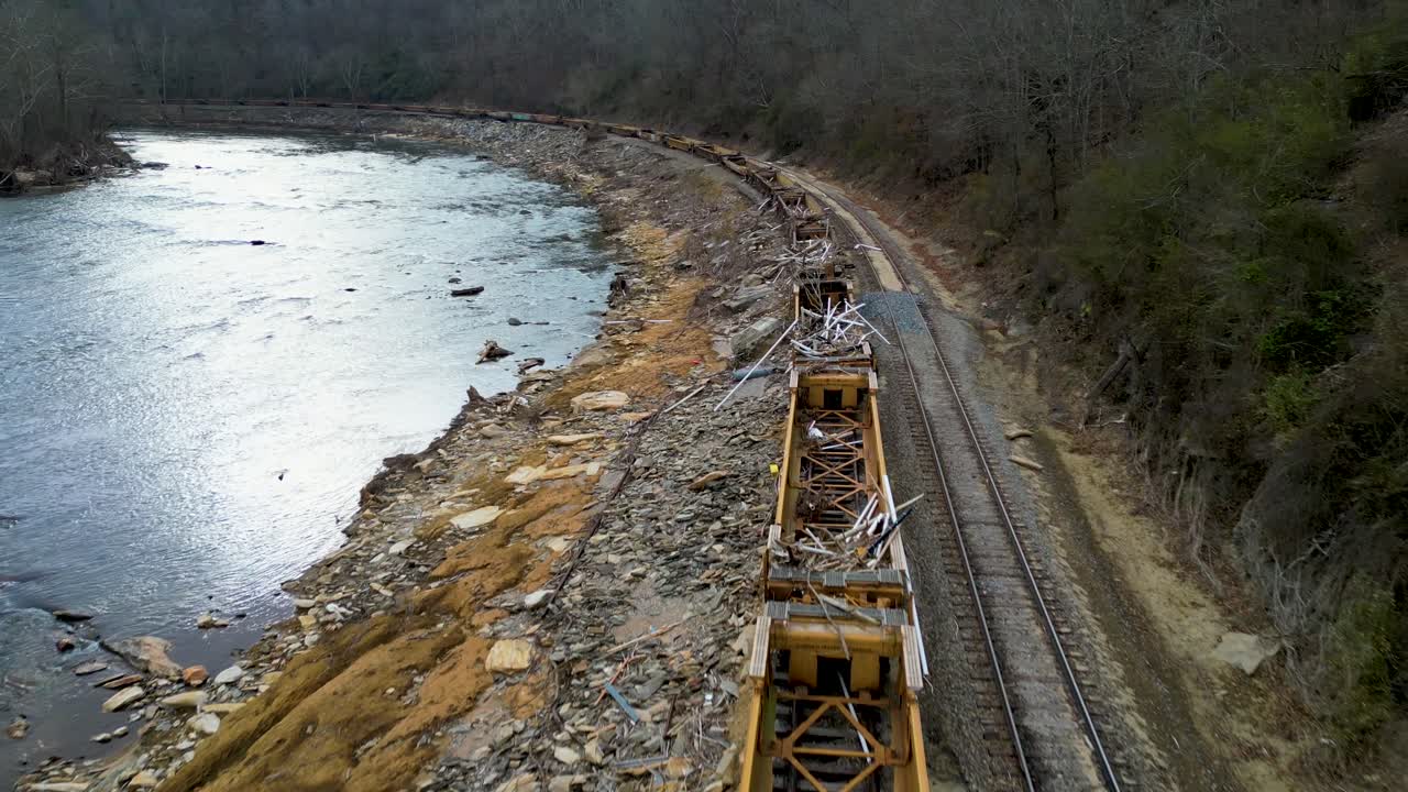 4K Aerial Drone Video of Train Full of Debris from Hurricane Helene Stranded on Track Along French Broad River near Marshall, NC (2024)