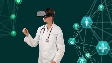 globe of digital icons against doctor using vr headset