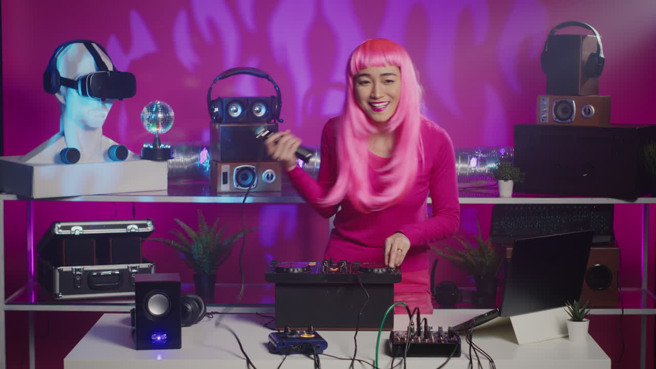 Woman with Pink Hair DJing with Turntable and Mixer