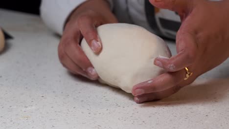 making the dough by a hand closeup shot