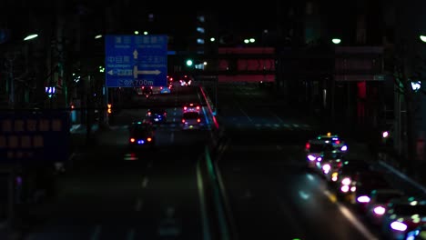 a night timelapse of the miniature traffic jam at the city street in tokyo