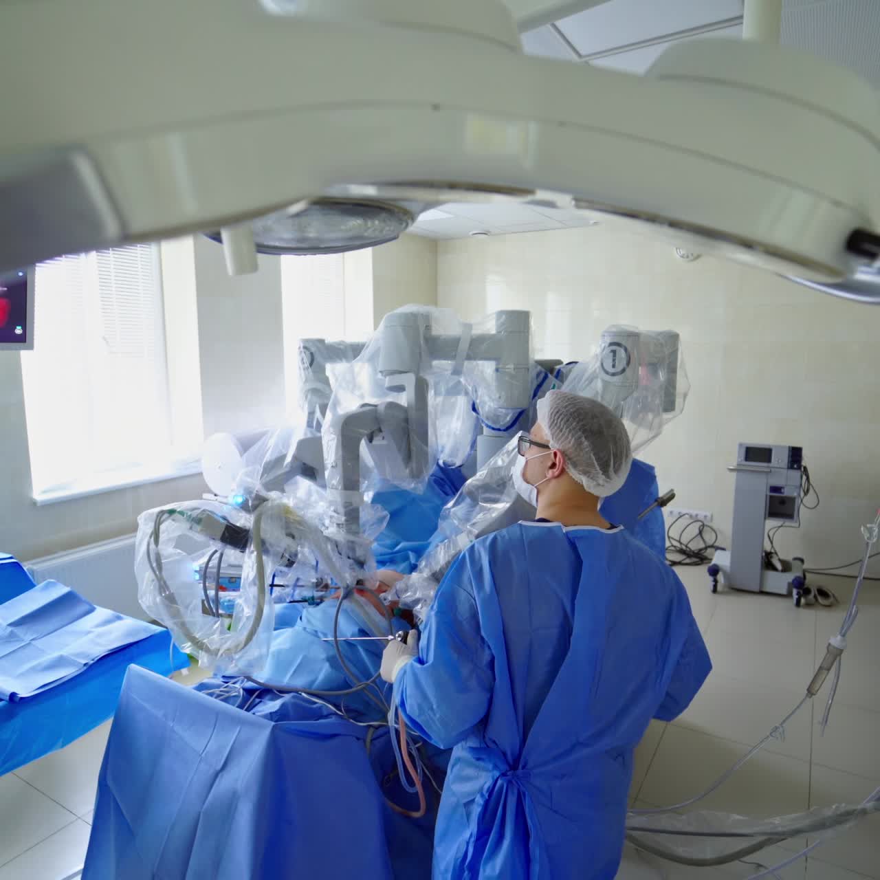 Medical Robot Da Vinci. Robot surgeon making surgery patient on the operating table