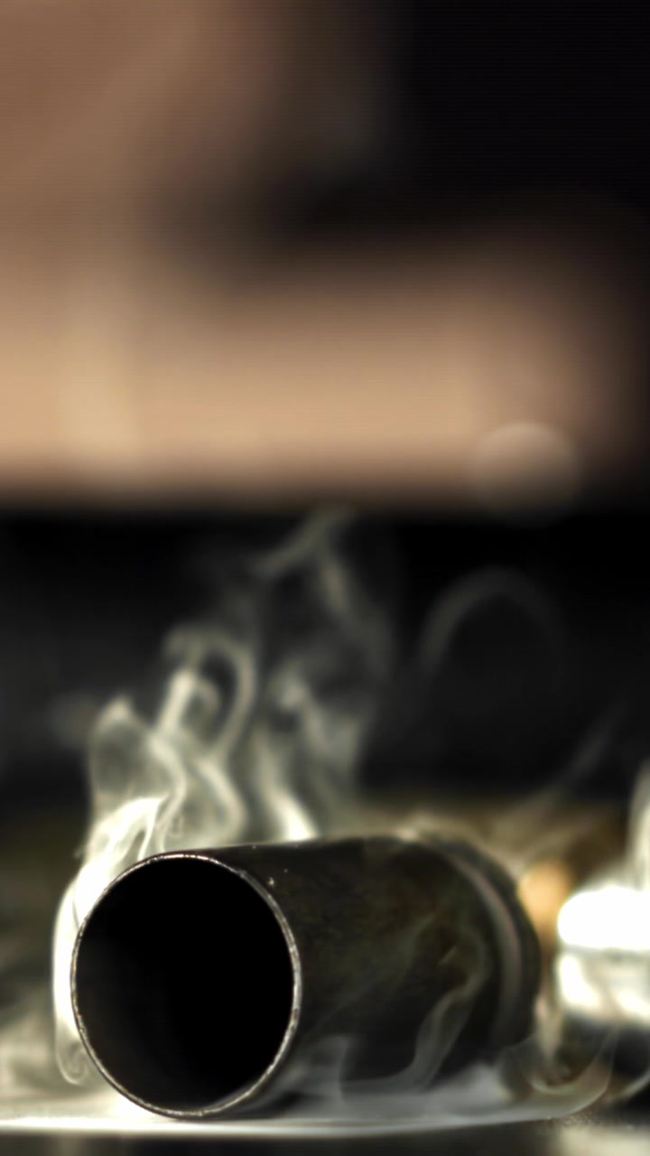Smoke Rising and Dissipating from a Metal Pipe